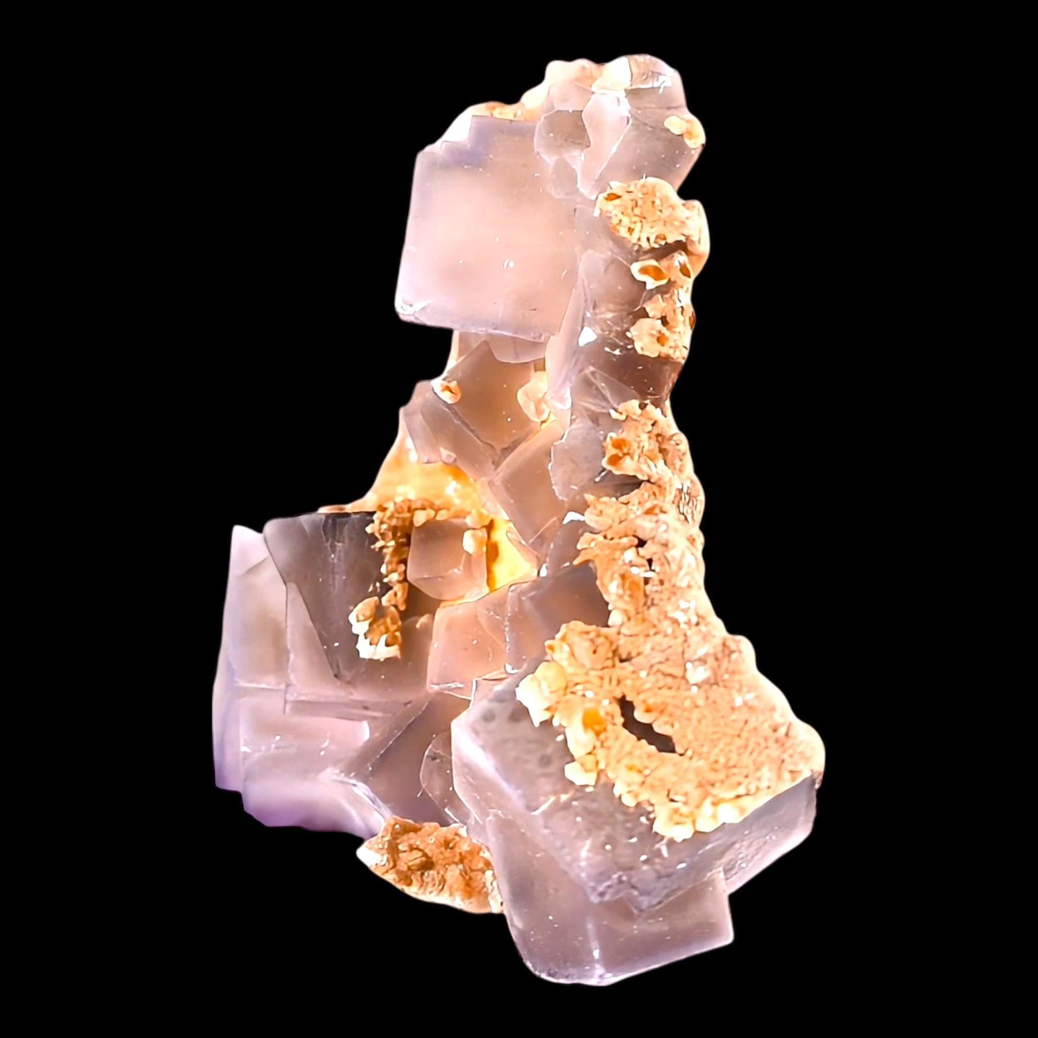 Purple fluorite with calcite for home decor or spiritual practise