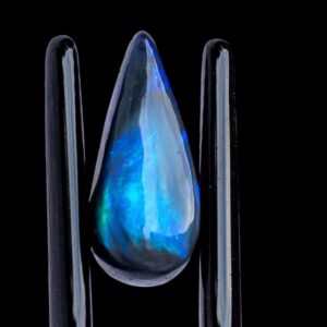 Black opal teardrop cabochon with vivid blue green flash, deep body tone, polished opal for pendant or ring, rare australian opal