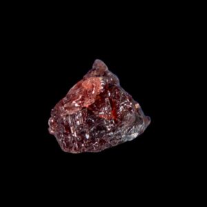 Etched spessartine garnet color change stone ideal for collectors of fine minerals or thumbnail displays from brazil